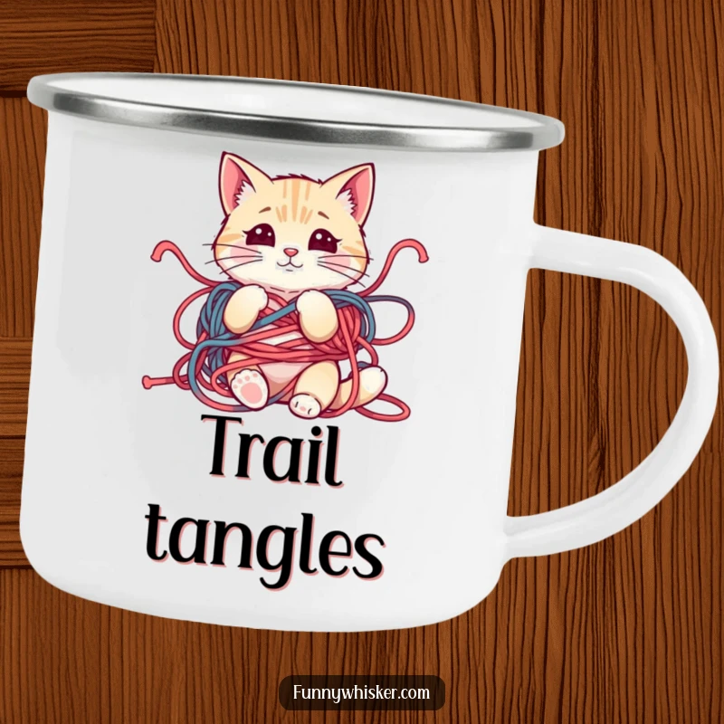 Funny camping mug featuring a cat tangled in yarn, whiskers askew, ready for the outdoors with a mischievous grin.