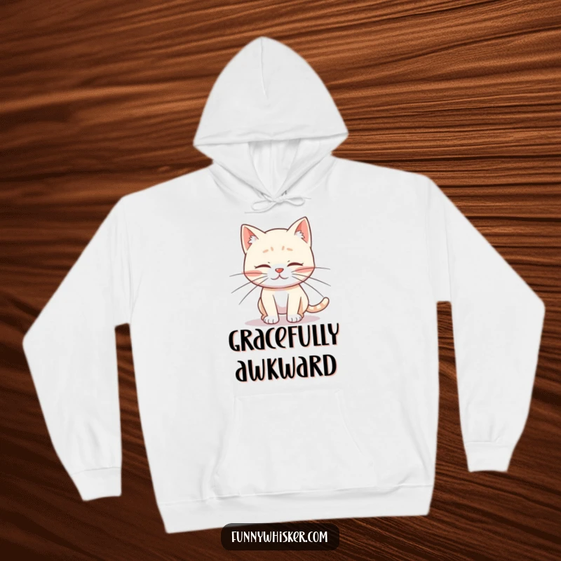 Funny hoodie showcasing a cat with long whiskers tripping over its feet, embodying adorable clumsiness and cozy feline humor.