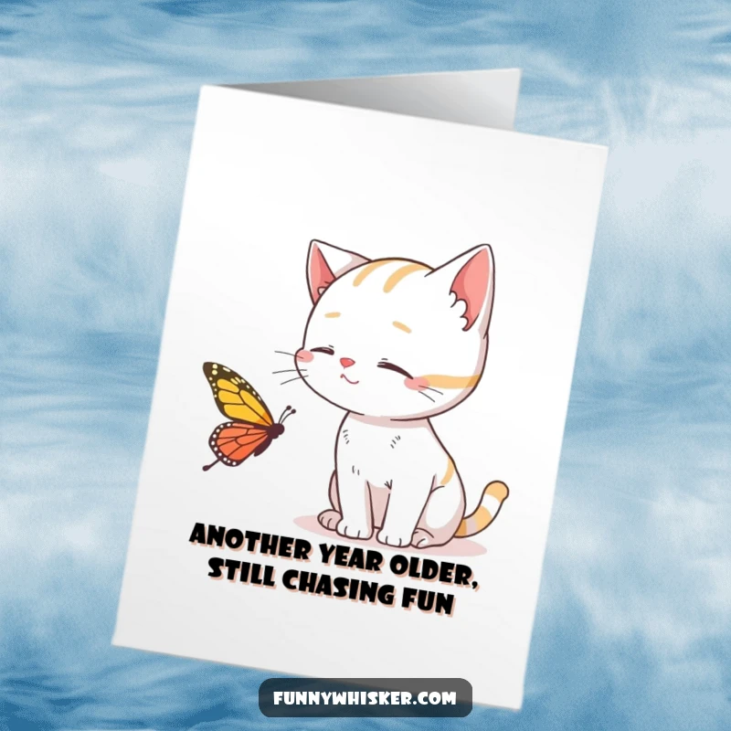 Funny Free Printable Cat Birthday Card: A cat with comically long whiskers trying to catch a butterfly, celebrating their special day.