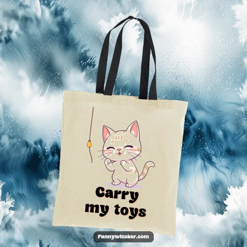 Funny tote bag illustrating a cat with large whiskers playfully batting at a dangling string, great for carrying items with a humorous feline theme.