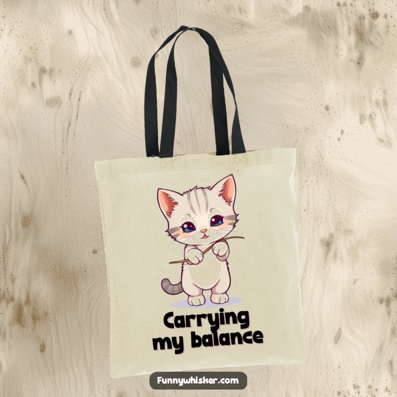 Funny kitten balancing on a wobbly whisker on a tote bag, symbolizing precarious fun, a great funny gift.