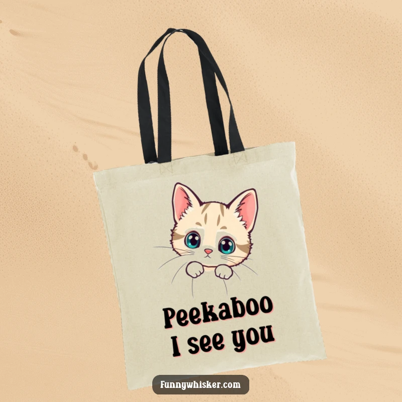 Funny tote bag with a tiny cat peeking curiously from behind a giant whisker, offering a blend of practical use and humor.